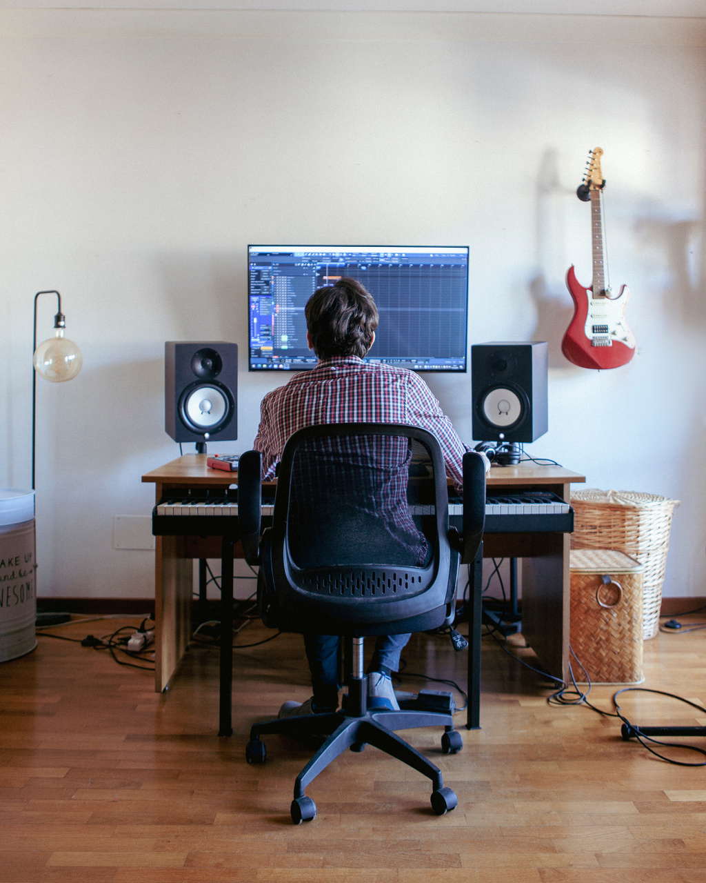 Producer Composing Music in Home Studio